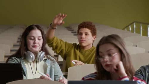 Intercultural Group of Students Attending Lecture in College