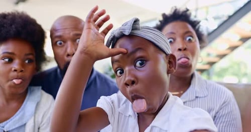 Whimsical Family Posing Together, Making Silly Faces