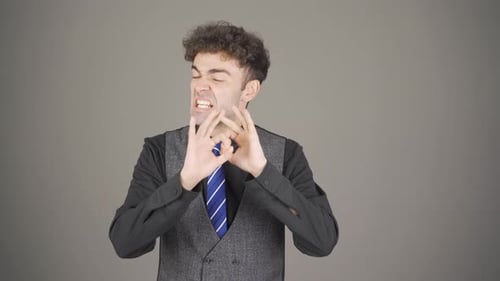 Adult Making Animated Gestures and Facial Expressions