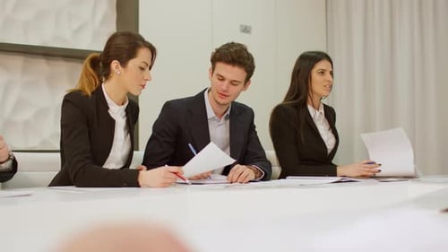 Young Professionals Working Together in Meeting