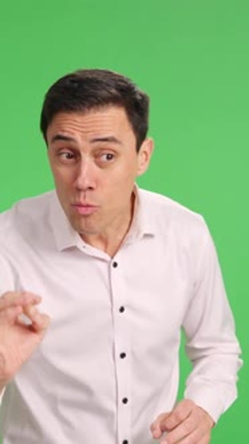 Businessman Giving Presentation on Green Screen Background
