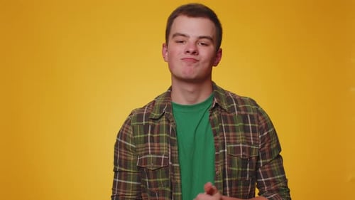 Young Adult Making Threatening Hand Gestures