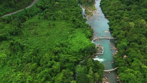 Drone, landscape and nature with river in forest for environment, countryside wildernesses