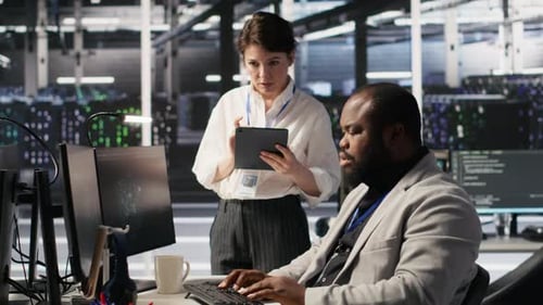 Server Room Manager Supervising Technician Examining Deep Learning Algorithms