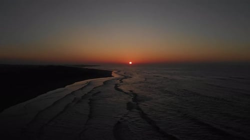 Drone 4K 30p Beautiful footage of Sunset Gold hour in Beach, smooth waves