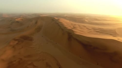 Desert landscape, nature sand and drone aerial view of natural horizon and texture sand dunes in Abu