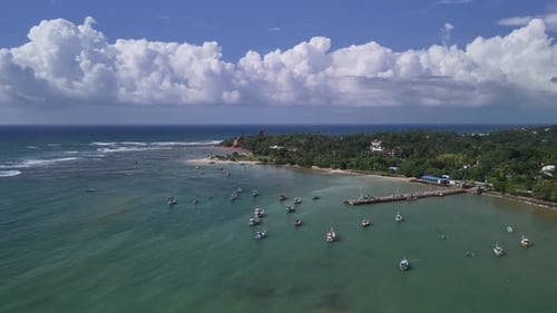 Fishing boats moored Sri Lanka south Asia coast Indian Ocean, aerial tropical landscape