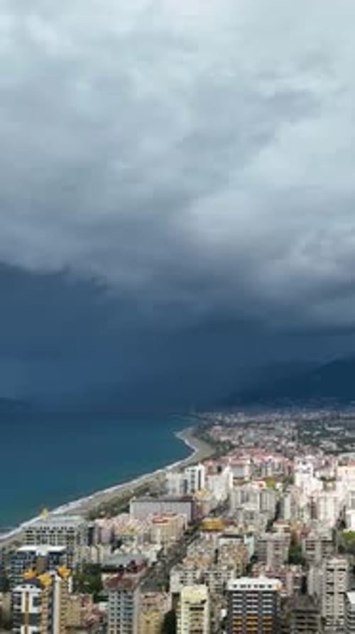 Vertical Video Above the Coastal Storm Aerial View of Mediterranean Coastline and City Panorama with