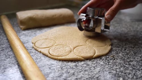 Baker Preparing And Cutting Pastry Dough For Baking - Close up shot