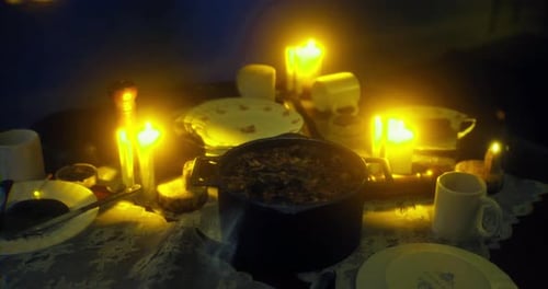 Flickering Candles Warm Dinner Table Setup