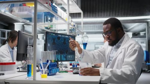 Scientists Working Diligently in a Modern Laboratory