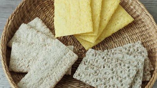 Variety of Crispbread in a Basket Top Down