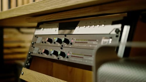 old displays of professional analog volume meters in a recording studio measuring and showing
