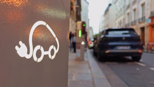 An Electric Vehicle Charging Station Located in a Busy Urban City Street Shot in Stunning Resolution
