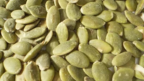 Vibrant green pumpkin kernels.