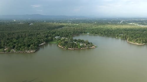 View From the Top of a Lake Surrounded By Thousands of Trees