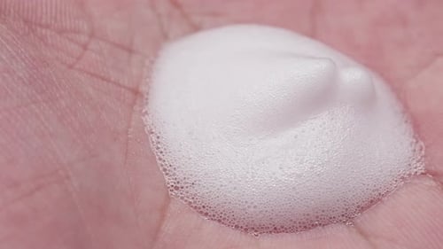 Foam soap in the palm of the hand