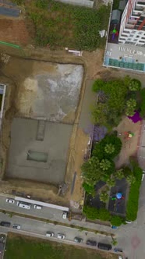 Vertical Video Concrete Foundation Pouring Starts As Builders Lay the Groundwork for a Multistory