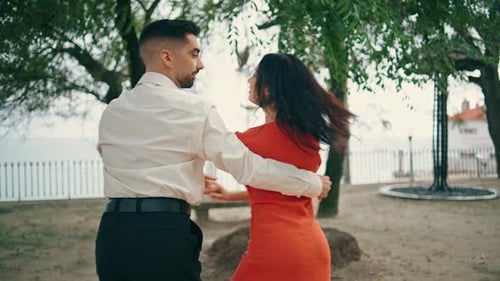 Sensual Beautiful Dancers Performing Latino Style on Street. Energetic Passionate Artists Dancing