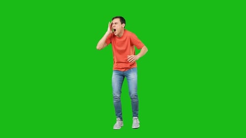 Amazed Man Touching Cheek in Studio