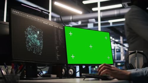 Close Up of Data Center Technician Using Green Screen PC