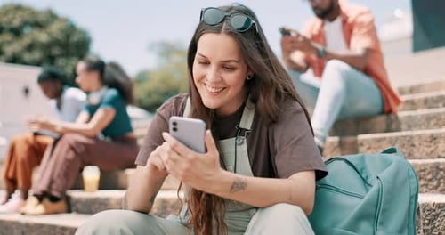 Happy woman, smartphone and student typing at university, social media and reading funny meme