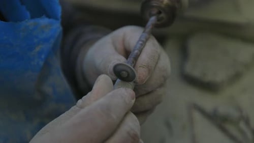 Macro of stone carving in a workshop