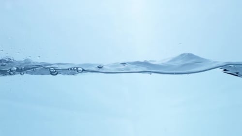 Close Up Water Ripples with Bubbles