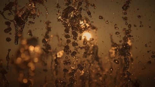 The Golden Water Splashes Vibrantly Under the Bright and Radiant Light of the Sun