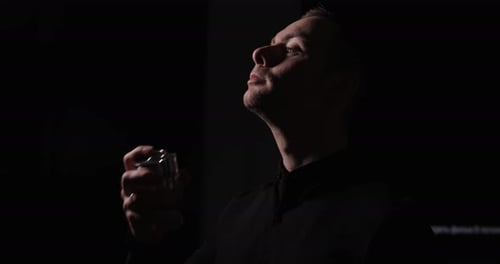 Man Spraying Perfume on His Neck Slow Motion