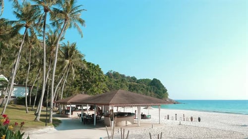 Relaxing Atmosphere on a Paradise Beach Resort with Turquoise Water