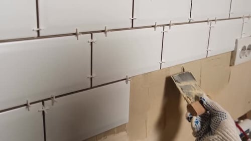 Tiler Spreading Adhesive for White Glossy Tiles