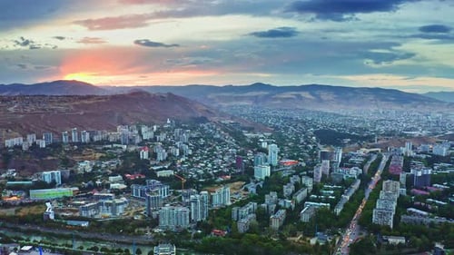 Aerial view – Sunset scenics of Tbilisi downtown districts and busy streets