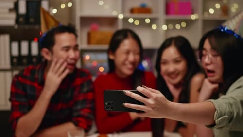 Group of Friends Video Calling at Celebration