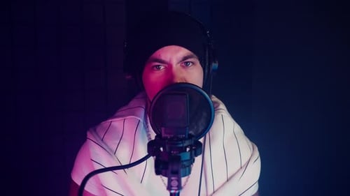 Emotional Rap Performance in Recording Studio