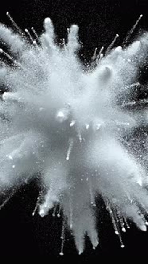 Dynamic White Powder Burst Explosion on Black Background