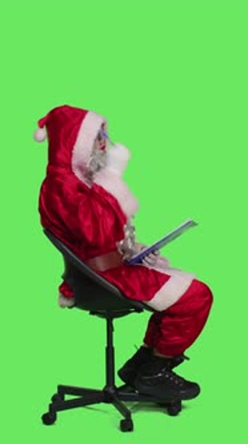 Vertical Video Profile of Winter Character Taking Notes on Papers