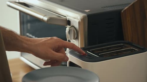 Making Golden Brown Toast in a Modern Kitchen
