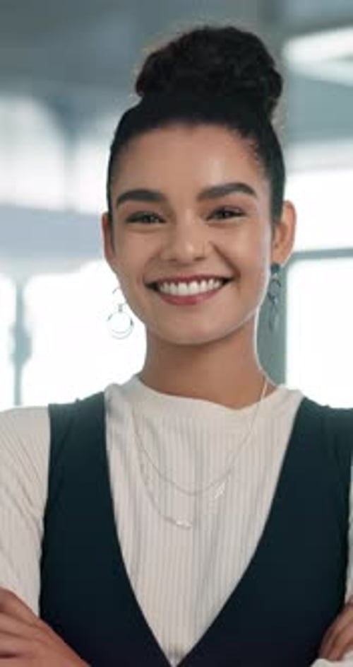 Face, creative and woman with arms crossed in office for career pride, about us