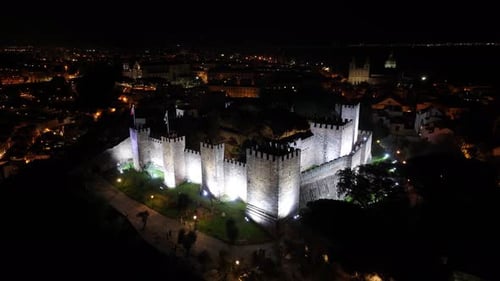 Sao Jorge Castle. Illuminated Medieval Castle. Beautiful Cityscape. Night City Landscape.