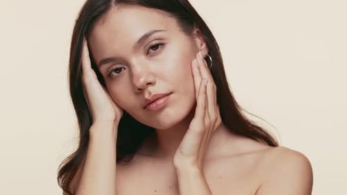 Attractive Woman Posing Elegantly For Beauty Commercial