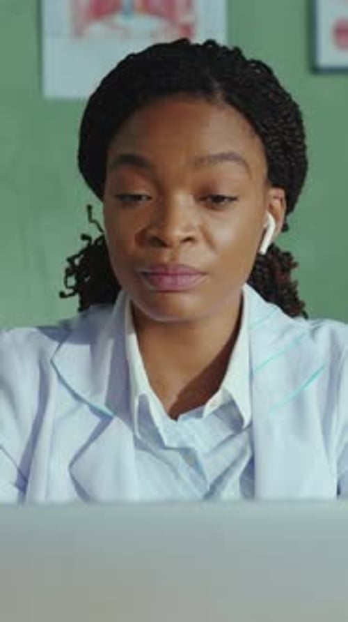 Doctor on Video Call in Office Setting