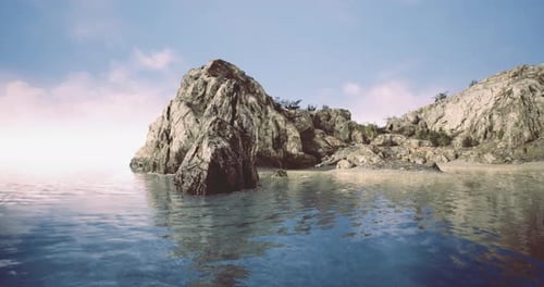 Serene Rocky Coastline with Calm Waters Reflecting a Blue Sky