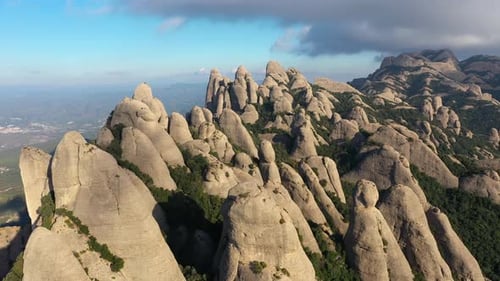 Aerial views of Montserrat peaks, a mountain range in Catalonia. Montserrat conglomerate crags