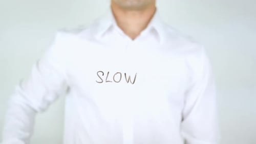 Slow, Man Writing on Glass