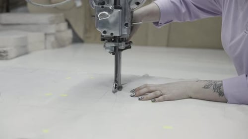 The Industrial Sector Utilizes Professional Machinery for Fabric Cutting Processes