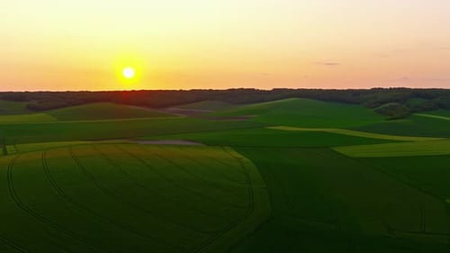 Aerial View of Covering Rolling Fields Endless Countryside in France at Sundown