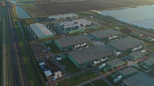 Aerial view of a modern ai data center at sunrise