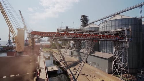 Grain Loading to Bulker Ship Cargo Container at Sea Grain Terminal in Seaport Wheat Shipment From