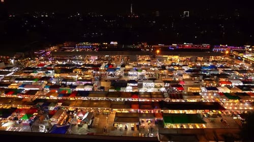 4k Top view of Train Night Market Ratchada (Talad Rot Fai) in Bangkok, Thailand, Asia. Static footag